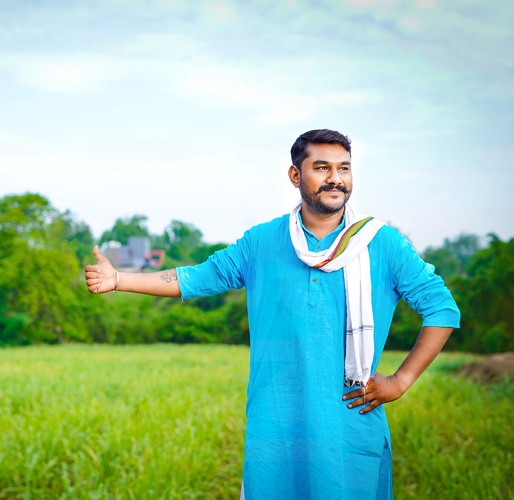 happy-young-indian-farmer-showing-hand-sugarcane-field-1